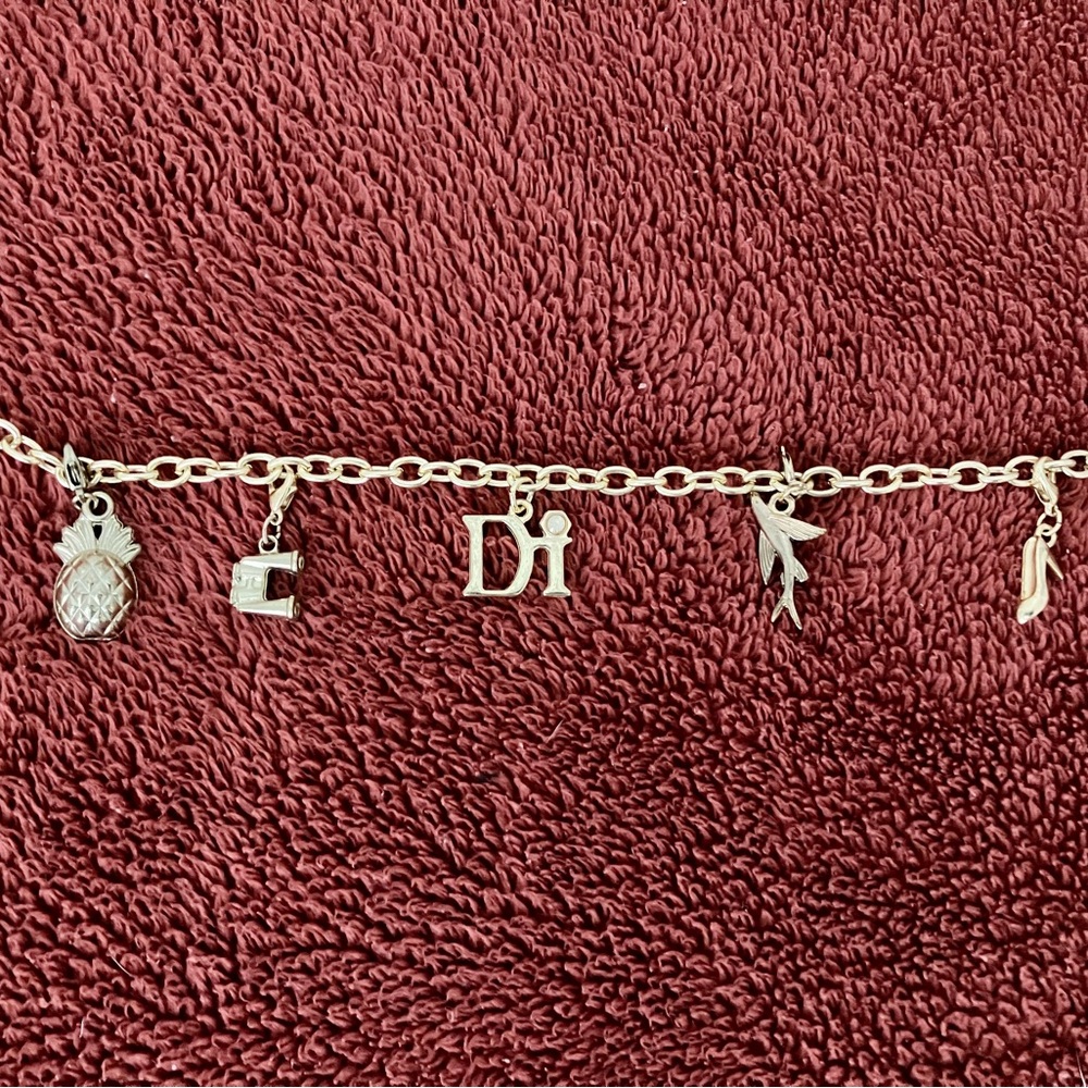 Gold Charm Bracelet with Di & Figure Charms